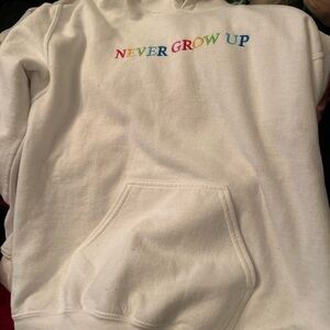 White Hoodie with Colorful 'Never Grow Up' Embroidery Baylin Levine